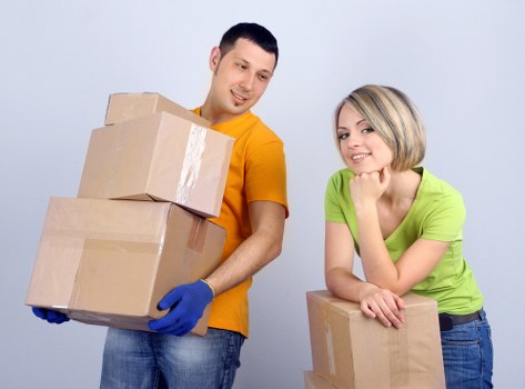 Office relocation service with packed equipment and desks in Stpauls