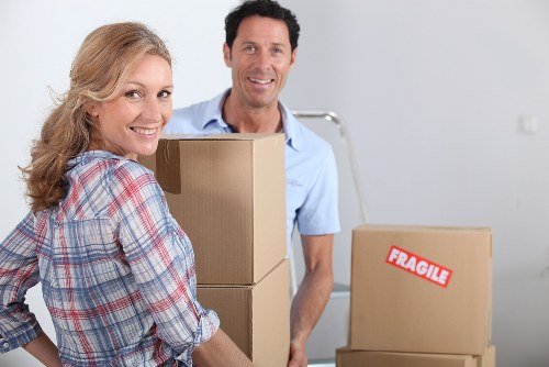 Experienced removalists carrying furniture carefully during a residential move in Stpauls
