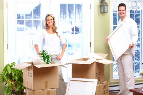 Professional movers loading items carefully onto a truck